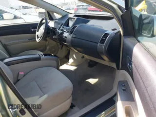 2007 Toyota Prius z VIN JTDKB20U877556527, wystawiony jako IAAI lot #41965245 z przebiegiem 259 572 mil mil oraz . Historia ofert i sprzedaży dostępna na DreamBid. Obrazek 5.