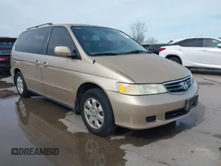 2002 Honda Odyssey EX-L z VIN 2HKRL18042H567858, wystawiony jako IAAI lot #41686147 z przebiegiem 264 570 mil mil oraz . Historia ofert i sprzedaży dostępna na DreamBid. Obrazek 1.