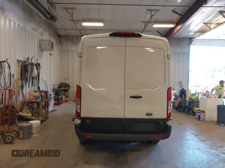 2018 Ford Transit z VIN 1FTBW2CM7JKA87273, wystawiony jako IAAI lot #42240277 z przebiegiem 80 226 mil mil oraz . Historia ofert i sprzedaży dostępna na DreamBid. Obrazek 16.