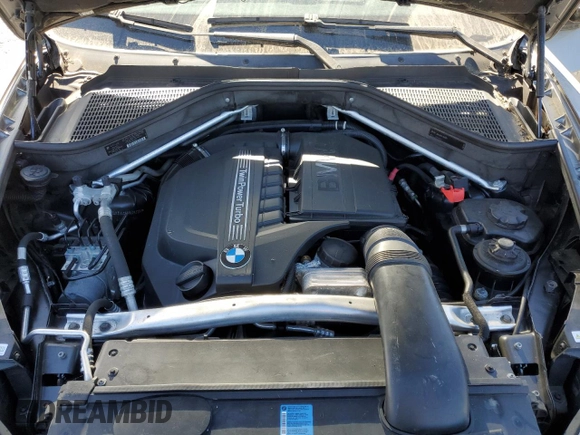 2011 BMW X5 35i z VIN 5UXZV4C50BL743135, wystawiony jako Copart lot #75401064 z przebiegiem 100 446 mil mil oraz Szkoda całkowita • Salvage title. Historia ofert i sprzedaży dostępna na DreamBid. Obrazek 12.