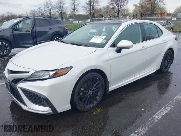 2022 Toyota Camry XSE z VIN 4T1K61AK2NU702362, wystawiony jako IAAI lot #41963393 z przebiegiem 13 541 mil mil oraz . Historia ofert i sprzedaży dostępna na DreamBid. Obrazek 17.
