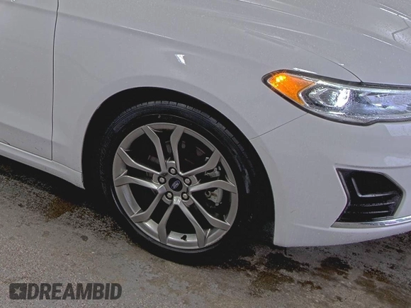 2020 Ford Fusion SEL with VIN 3FA6P0CD6LR216742, listed as a IAAI auction lot 42725035 with 74,298 mi miles and . Bid and sale history available at DreamBid. Image 1.