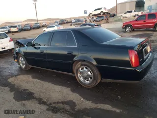 2005 Cadillac DeVille with VIN 1G6KD54Y45U165109, listed as a Copart auction lot 84695674 with 92,569 mi miles and Salvage Title. Bid and sale history available at carsss.com. Image 2.