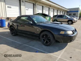 2002 Ford Mustang GT Deluxe with VIN 1FAFP45X02F201213, listed as a Copart auction lot 56493595 with 81,776 mi miles and Salvage title. Bid and sale history available at DreamBid. Image 4.