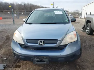 2007 Honda CR-V LX with VIN JHLRE48397C098021, listed as a IAAI auction lot 41864761 with 213,482 mi miles. Bid and sale history available at carsss.com. Image 12.