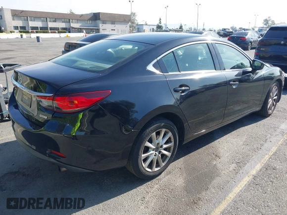 2016 Mazda 6 i Sport with VIN JM1GJ1U51G1445925, listed as a IAAI auction lot 41980386 with Not Provided miles and . Bid and sale history available at DreamBid. Image 4.