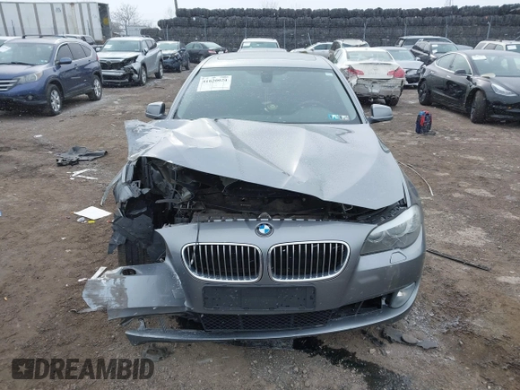 2013 BMW 5 Series 528i xDrive with VIN WBAXH5C5XDD108889, listed as a IAAI auction lot 41620024 with 103,542 mi miles. Bid and sale history available at carsss.com. Image 12.