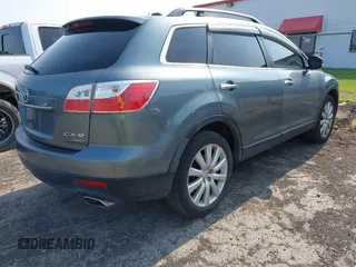 2010 Mazda CX-9 Grand Touring z VIN JM3TB3MV4A0203836, wystawiony jako IAAI lot #42411460 z przebiegiem 156 327 mil mil oraz . Historia ofert i sprzedaży dostępna na DreamBid. Obrazek 4.