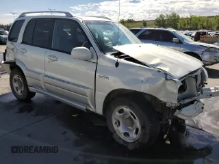 2005 Suzuki Grand Vitara LX z VIN JS3TD62V854201465, wystawiony jako Copart lot #61460344 z przebiegiem 204 784 mil mil oraz Szkoda całkowita • Salvage title. Historia ofert i sprzedaży dostępna na DreamBid. Obrazek 4.