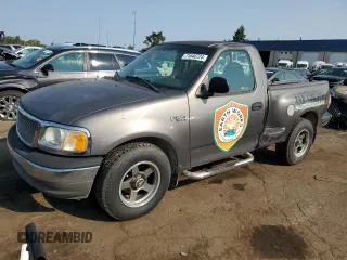 2002 Ford F-150 XL z VIN 1FTRF07202KA56864, wystawiony jako Copart lot #71640724 z przebiegiem 165 654 mil mil oraz Szkoda całkowita • Salvage title. Historia ofert i sprzedaży dostępna na DreamBid. Obrazek 1.
