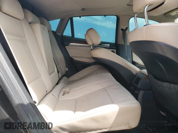2012 BMW X6 35i z VIN 5UXFG2C56CL780774, wystawiony jako Copart lot #55003335 z przebiegiem 227 097 mil mil oraz Czysty tytuł • Clean title. Historia ofert i sprzedaży dostępna na DreamBid. Obrazek 11.