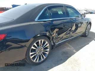 2017 Lincoln Continental Select with VIN 1LN6L9SK0H5614805, listed as a IAAI auction lot 41859275 with 123,655 mi miles. Bid and sale history available at carsss.com. Image 6.