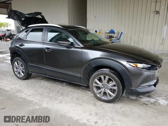 2023 Mazda CX-30 S Carbon Edition with VIN 3MVDMBCM9PM506691, listed as a Copart auction lot 55864895 with 21,441 mi miles and Salvage title. Bid and sale history available at DreamBid. Image 4.