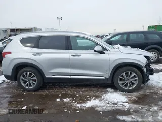 2019 Hyundai Santa Fe Ultimate with VIN 5NMS5CAD1KH000394, listed as a IAAI auction lot 41455421 with 42,886 mi miles and . Bid and sale history available at DreamBid. Image 13.