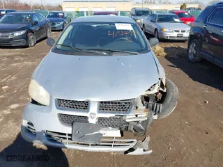 2004 Dodge Stratus SXT with VIN 1B3EL46X64N128617, listed as a IAAI auction lot 41584871 with 140,316 mi miles. Bid and sale history available at carsss.com. Image 12.