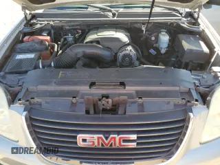 2007 GMC Yukon SLE z VIN 1GKFK13007J260249, wystawiony jako Copart lot #57646525 z przebiegiem 325 491 mil mil oraz Szkoda całkowita • Salvage title. Historia ofert i sprzedaży dostępna na DreamBid. Obrazek 12.