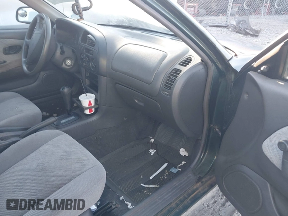 1999 Mitsubishi Mirage DE z VIN JA3AY26A0XU017889, wystawiony jako IAAI lot #40457172 z przebiegiem Nie podano mil oraz . Historia ofert i sprzedaży dostępna na DreamBid. Obrazek 5.