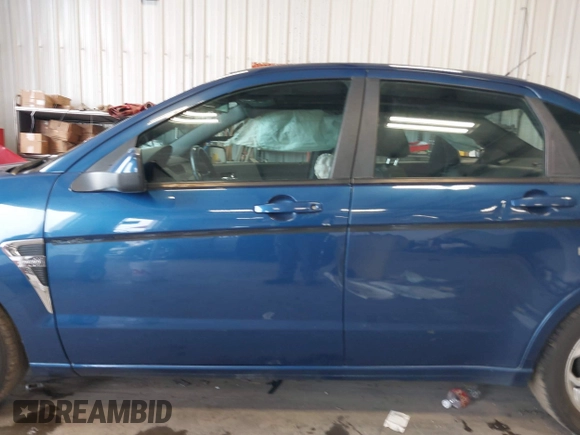 2008 Ford Focus SE with VIN 1FAHP35N78W191984, listed as a IAAI auction lot 41839286 with 129,290 mi miles. Bid and sale history available at carsss.com. Image 14.