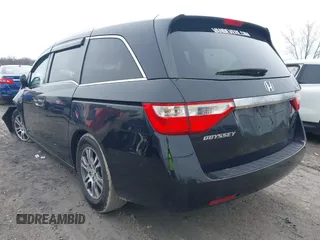 2012 Honda Odyssey EX-L with VIN 5FNRL5H63CB070361, listed as a IAAI auction lot 42025024 with 152,258 mi miles and . Bid and sale history available at carsss.com. Image 3.