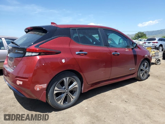 2018 Nissan LEAF S with VIN 1N4AZ1CP2JC303571, listed as a Copart auction lot 55249995 with 33,009 mi miles and Salvage Title. Bid and sale history available at DreamBid. Image 3.
