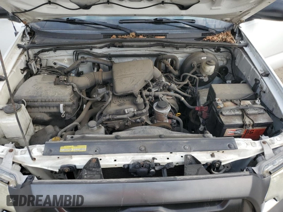 2014 Toyota Tacoma with VIN 5TFNX4CN7EX037335, listed as a Copart auction lot 60733635 with 115,341 mi miles and Salvage title. Bid and sale history available at DreamBid. Image 11.