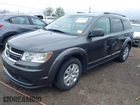 2017 Dodge Journey SE with VIN 3C4PDCAB9HT603595, listed as a IAAI auction lot 41914690 with 104,960 mi miles and . Bid and sale history available at DreamBid. Image 18.