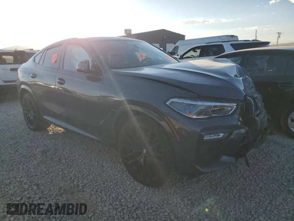 2021 BMW X6 M50i with VIN 5UXCY8C02M9G71110, listed as a Copart auction lot 76124114 with 0 mi miles and Salvage Title. Bid and sale history available at carsss.com. Image 4.