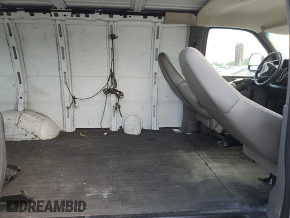 2008 Chevrolet Express Cargo with VIN 1GCGG25C781137094, listed as a Copart auction lot 56494395 with 100,037 mi miles and Salvage title. Bid and sale history available at DreamBid. Image 11.
