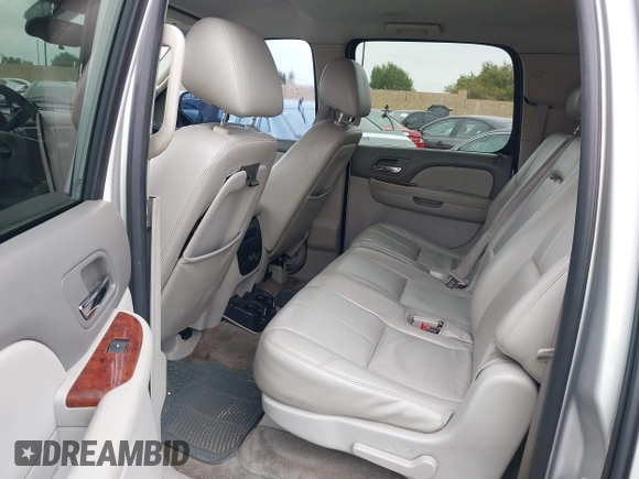 2010 Chevrolet Suburban LT with VIN 1GNUCJE03AR238548, listed as a IAAI auction lot 42104596 with 153,959 mi miles and . Bid and sale history available at DreamBid. Image 8.