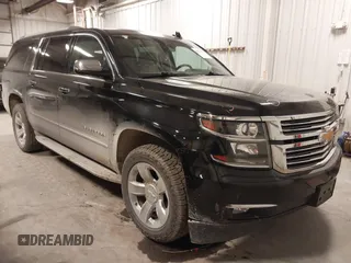 2017 Chevrolet Suburban Premier with VIN 1GNSKJKC0HR250854, listed as a IAAI auction lot 41541476 with 128,231 mi miles and . Bid and sale history available at DreamBid. Image 1.