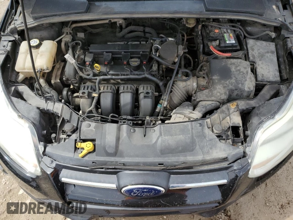 2013 Ford Focus SE z VIN 1FADP3F28DL292238, wystawiony jako Copart lot #51016715 z przebiegiem 165 699 mil mil oraz Szkoda całkowita • Salvage title. Historia ofert i sprzedaży dostępna na DreamBid. Obrazek 11.
