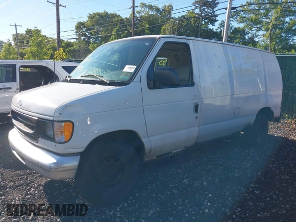 2002 Ford Econoline Cargo with VIN 1FTRE142X2HA95262, listed as a IAAI auction lot 39771693 with 204,642 mi miles. Bid and sale history available at carsss.com. Image 2.