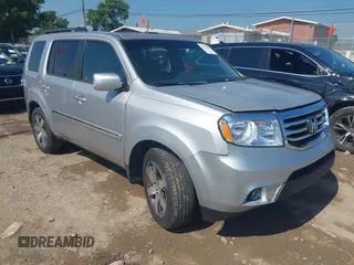 2012 Honda Pilot Touring with VIN 5FNYF3H99CB026754, listed as a IAAI auction lot 42773615 with 91,333 mi miles and . Bid and sale history available at DreamBid. Image 1.