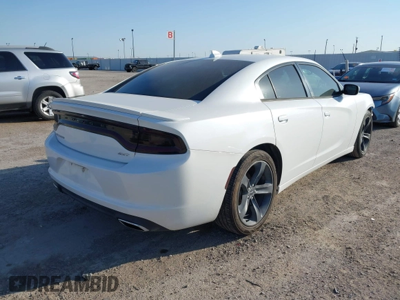 2015 Dodge Charger SXT with VIN 2C3CDXHG8FH730145, listed as a IAAI auction lot 42039927 with 156,135 mi miles and . Bid and sale history available at DreamBid. Image 4.