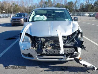 2010 Dodge Grand Caravan SE with VIN 2D4RN4DE2AR489971, listed as a IAAI auction lot 41895646 with 58,463 mi miles and . Bid and sale history available at DreamBid. Image 12.