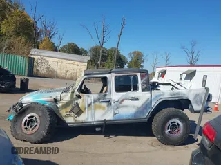 2020 Jeep Gladiator Sport S with VIN 1C6HJTAG3LL109494, listed as a IAAI auction lot 40677949 with 52,079 mi miles and . Bid and sale history available at DreamBid. Image 14.