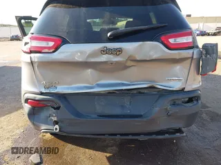 2016 Jeep Cherokee Latitude with VIN 1C4PJMCB5GW218166, listed as a IAAI auction lot 40458497 with 145,272 mi miles and . Bid and sale history available at carsss.com. Image 6.
