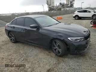 2022 BMW 3 Series 330i with VIN 3MW5R1J06N8C45380, listed as a Copart auction lot 50214105 with 49,995 mi miles and Salvage Title. Bid and sale history available at carsss.com. Image 4.