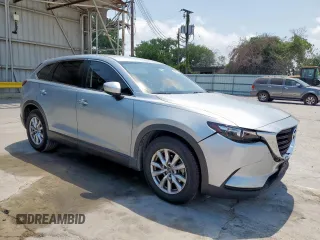2017 Mazda CX-9 Sport с VIN JM3TCABY0H0134894, выставлен на аукционе Copart как лот 58217865 с пробегом 100 227 миль миль и Списание • Salvage title. История ставок и продаж доступна на DreamBid. Изображение 4.
