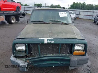 2000 Jeep Cherokee with VIN 1J4FT48S4YL240347, listed as a IAAI auction lot 42361311 with Not provided miles and . Bid and sale history available at DreamBid. Image 6.