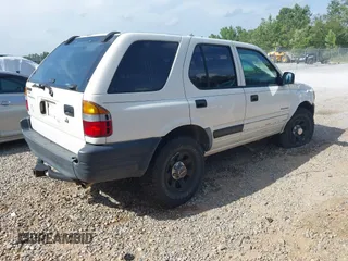 1998 Isuzu Rodeo with VIN 4S2CK58D3W4301606, listed as a IAAI auction lot 42453329 with 219,433 mi miles and . Bid and sale history available at DreamBid. Image 4.