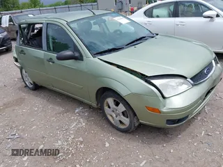 2007 Ford Focus S z VIN 1FAHP37N47W278284, wystawiony jako IAAI lot #42246383 z przebiegiem 164 830 mil mil oraz . Historia ofert i sprzedaży dostępna na DreamBid. Obrazek 1.