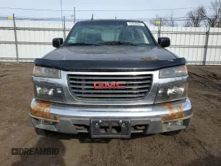 2012 GMC Canyon SLE1 with VIN 1GTJ6MFEXC8114414, listed as a Copart auction lot 52058665 with 219,538 mi miles and Clean title. Bid and sale history available at DreamBid. Image 5.