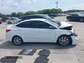 2014 Hyundai Accent GLS with VIN KMHCU4AE6EU766796, listed as a IAAI auction lot 41933743 with 99,142 mi miles. Bid and sale history available at carsss.com. Image 13.