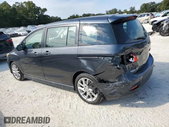 2012 Mazda 5 Grand Touring with VIN JM1CW2DLXC0128553, listed as a Copart auction lot 75610954 with 143,462 mi miles and Salvage Title. Bid and sale history available at DreamBid. Image 2.