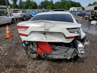 2019 Honda Accord EX z VIN 1HGCV1F4XKA160108, wystawiony jako Copart lot #57134665 z przebiegiem 152 412 mil mil oraz Szkoda całkowita • Salvage title. Historia ofert i sprzedaży dostępna na DreamBid. Obrazek 6.