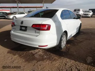 2016 Volkswagen Jetta Sedan 1.4T SE w/Connectivity with VIN 3VWD67AJ9GM360727, listed as a IAAI auction lot 41430367 with 124,993 mi miles. Bid and sale history available at carsss.com. Image 4.