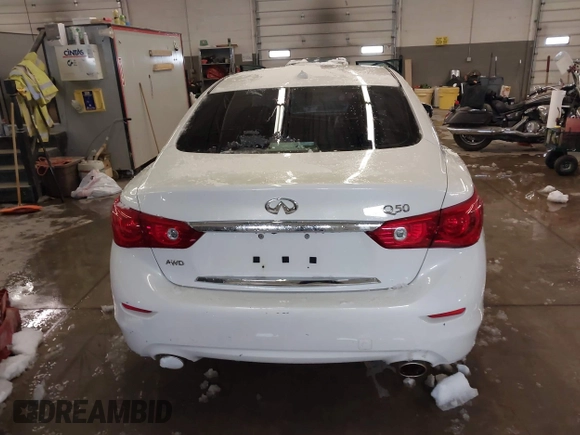 2015 Infiniti Q50 Premium z VIN JN1BV7AR0FM417283, wystawiony jako IAAI lot #41579549 z przebiegiem 112 407 mil mil oraz . Historia ofert i sprzedaży dostępna na DreamBid. Obrazek 17.