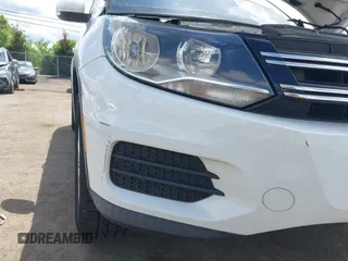 2014 Volkswagen Tiguan S with VIN WVGBV3AX0EW589381, listed as a IAAI auction lot 42186999 with 144,137 mi miles and . Bid and sale history available at DreamBid. Image 6.