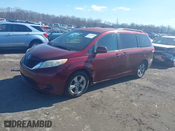 2012 Toyota Sienna LE AAS with VIN 5TDKK3DCXCS244605, listed as a IAAI auction lot 41516400 with 186,198 mi miles. Bid and sale history available at carsss.com. Image 2.